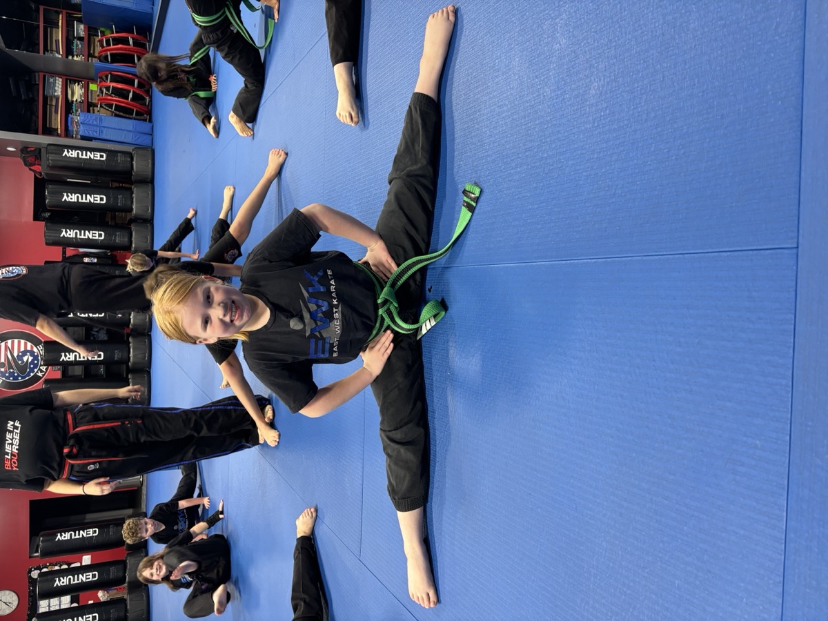 Advanced student demonstrating flexibility at East West Karate